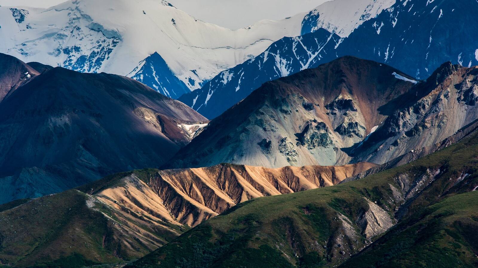 <p class="MsoNormal">The Alaska Range late in the evening on a summer solstice. Denali experiences nearly 24 hours of light on the longest day of the year.</p>